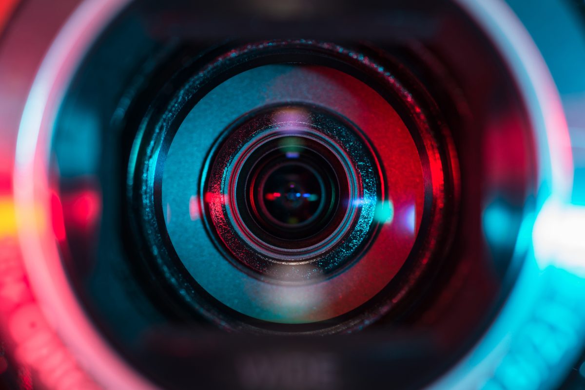 Picture of camera with bright colorful lighting around it